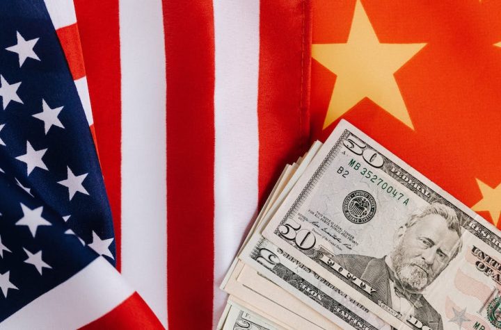 american-and-chinese-flags-and-usa-dollars