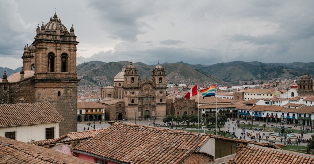 cityscape-of-medieval-church-and-houses-with-old-tile-roof-in-cusco-peru