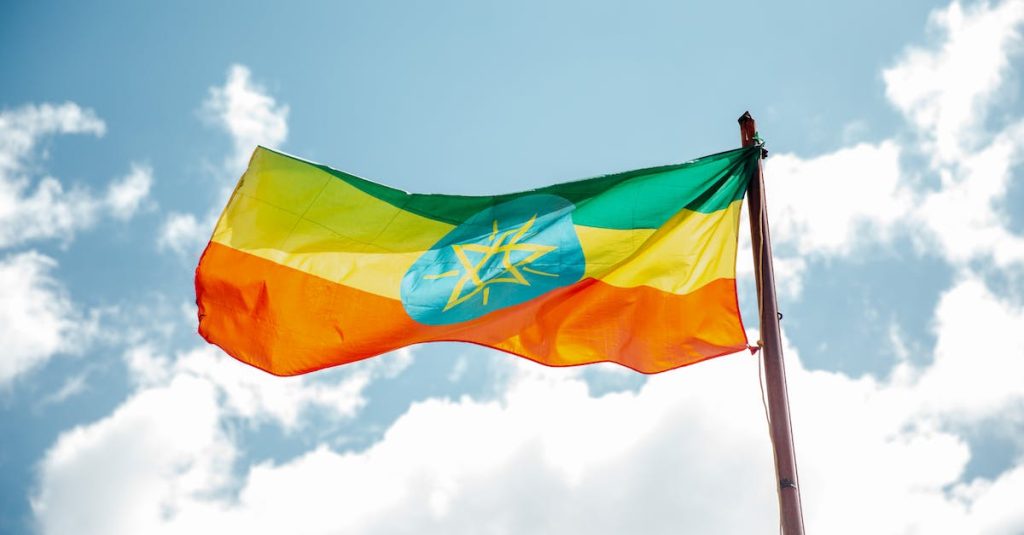 national-colorful-flag-of-ethiopia-under-cloudy-sky