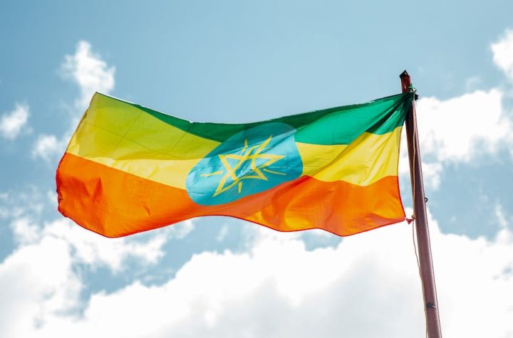 national-colorful-flag-of-ethiopia-under-cloudy-sky