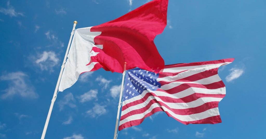 red-and-white-flag-under-blue-sky