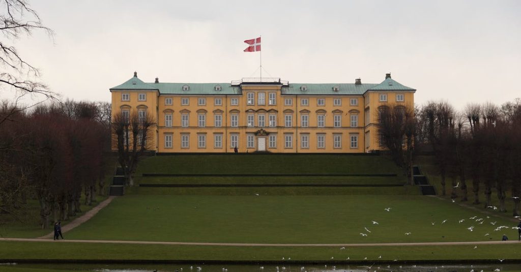 white-birds-flying-in-front-of-frederiksberg-palace